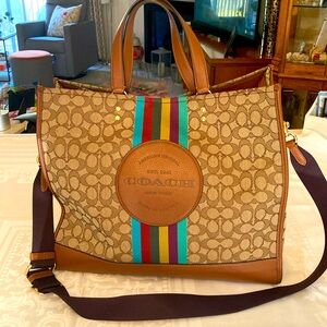 Coach Dempsey 40 Tote in signature Jacquard with stripes and patch. Used